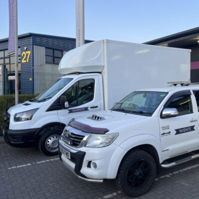 nvents pickup truck and luton van parked outside the warehouse